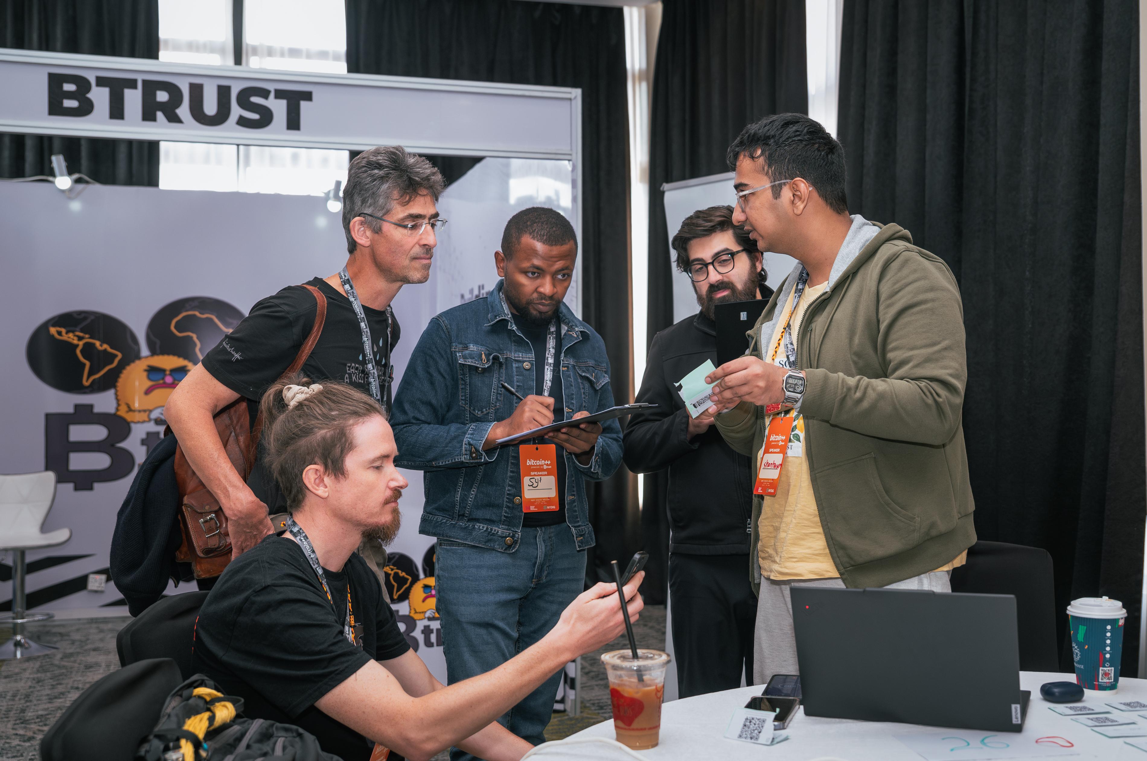Alex Gleason, Sam, and Shantaram judging the hackathon at BTC++ Nairobi, June 2026